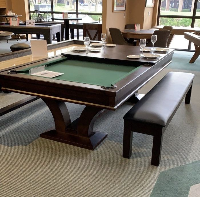 Convertible dining table that transforms into a pool table